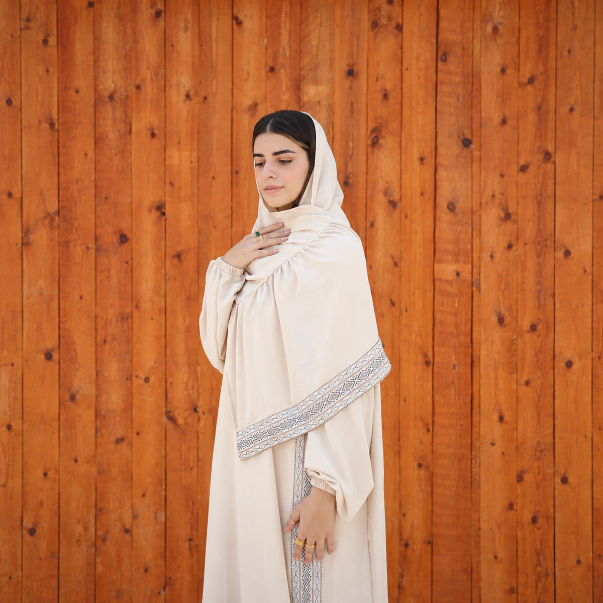Model wearing Tallah's beige CY Isdal with vertical trim panel, gallery photo 3