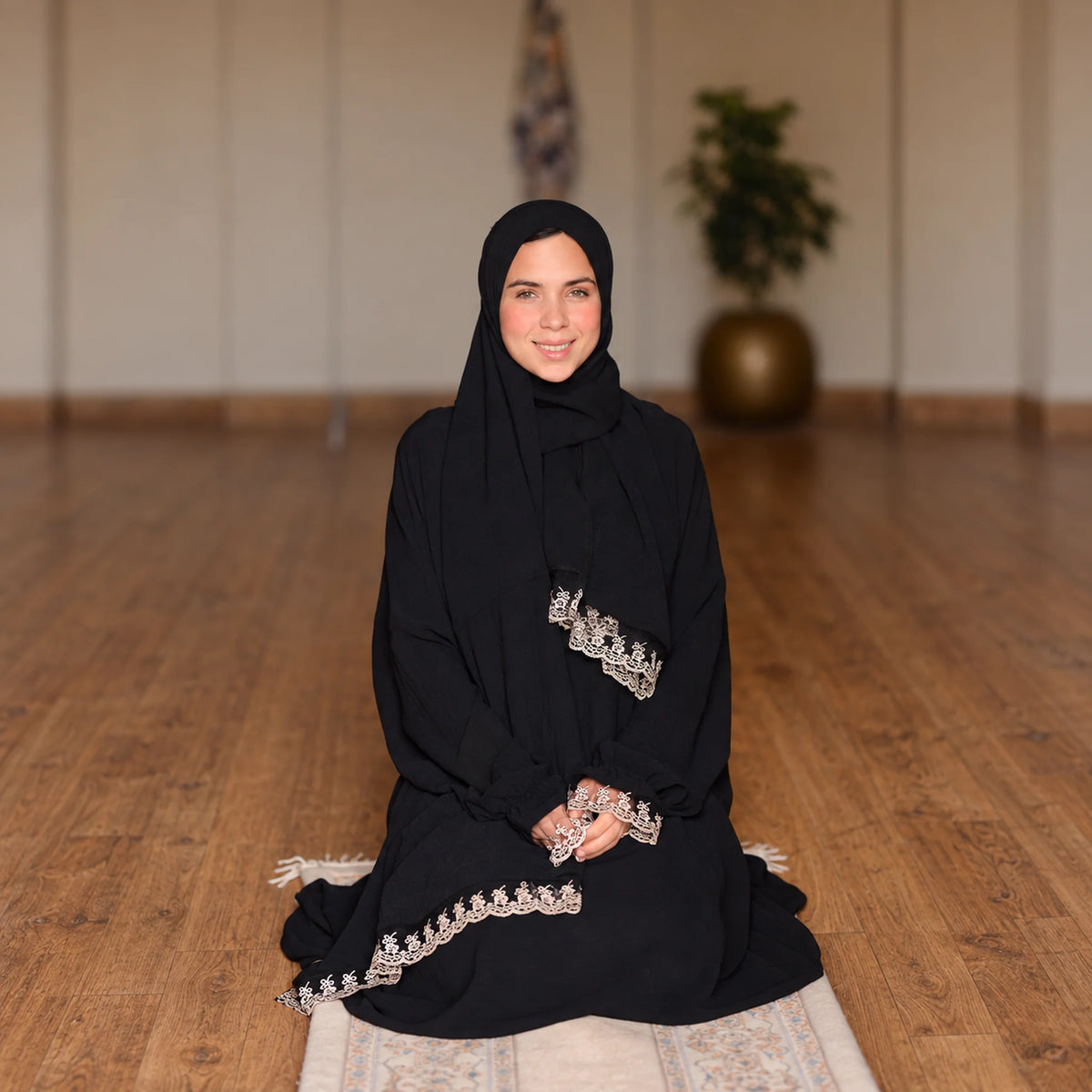 Model wearing Tallah's black CY Isdal with lace trim, gallery photo 2