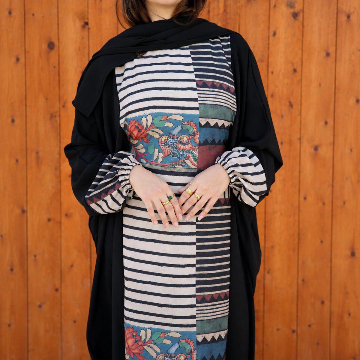 Model wearing Tallah's black CY Isdal with mixed-print split panel, gallery photo 5
