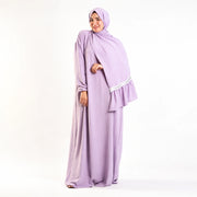 Model wearing Tallah's lilac CY Isdal with lace trim, gallery photo 1