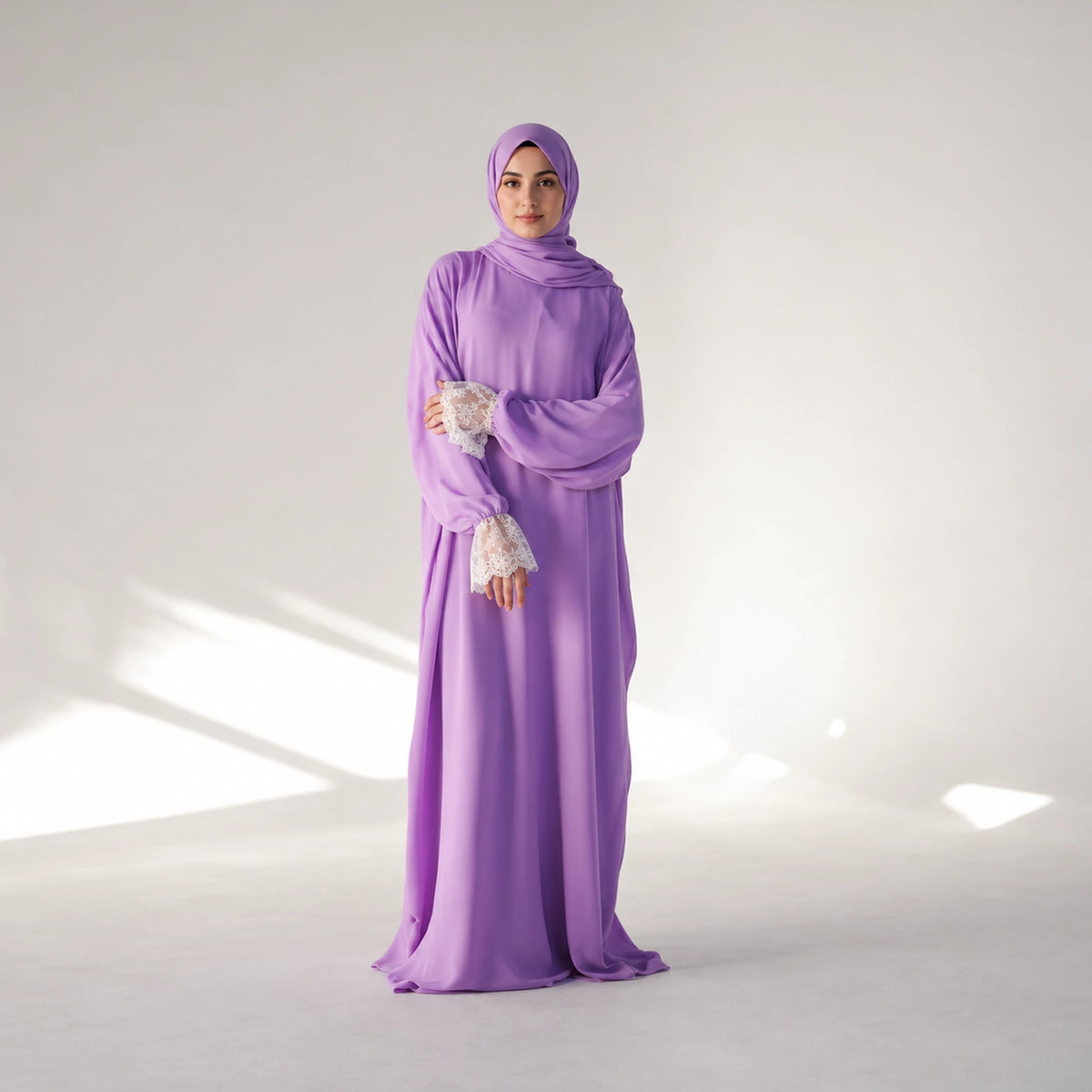 Alternate view 2 of a cy isdal in lilac, white lace cuffs.