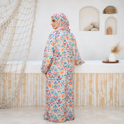 Model wearing Tallah's multicolour floral mosaic-print Soft Mabrad Isdal, gallery photo 1