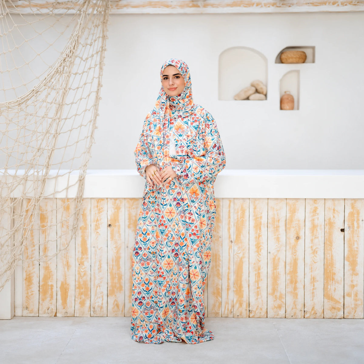 Model wearing Tallah's multicolour floral mosaic-print Soft Mabrad Isdal, gallery photo 4