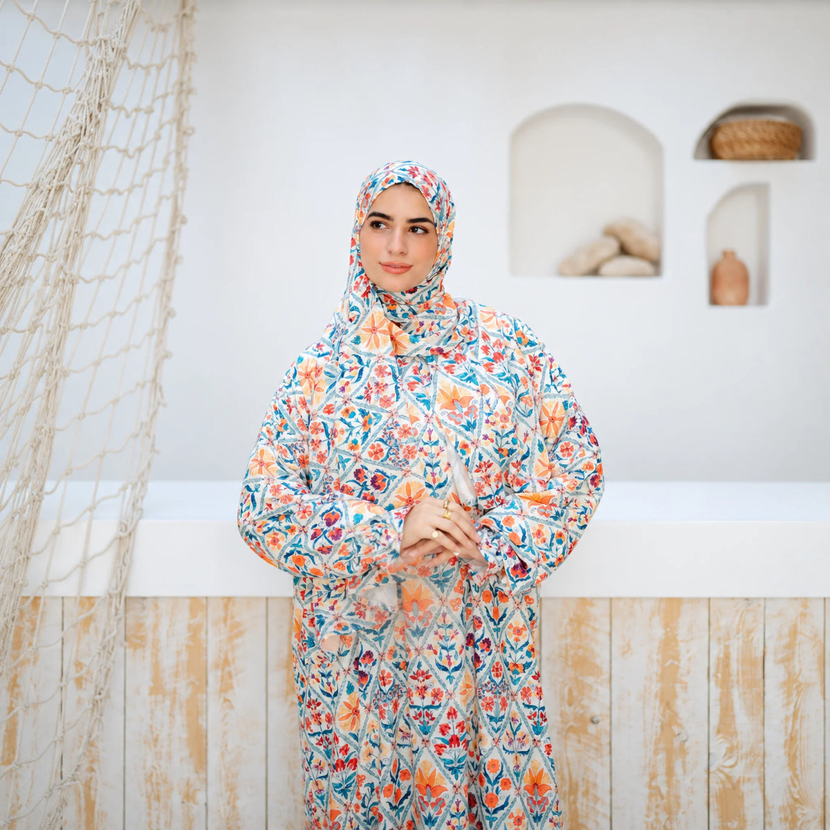 Model wearing Tallah's multicolour floral mosaic-print Soft Mabrad Isdal, gallery photo 6