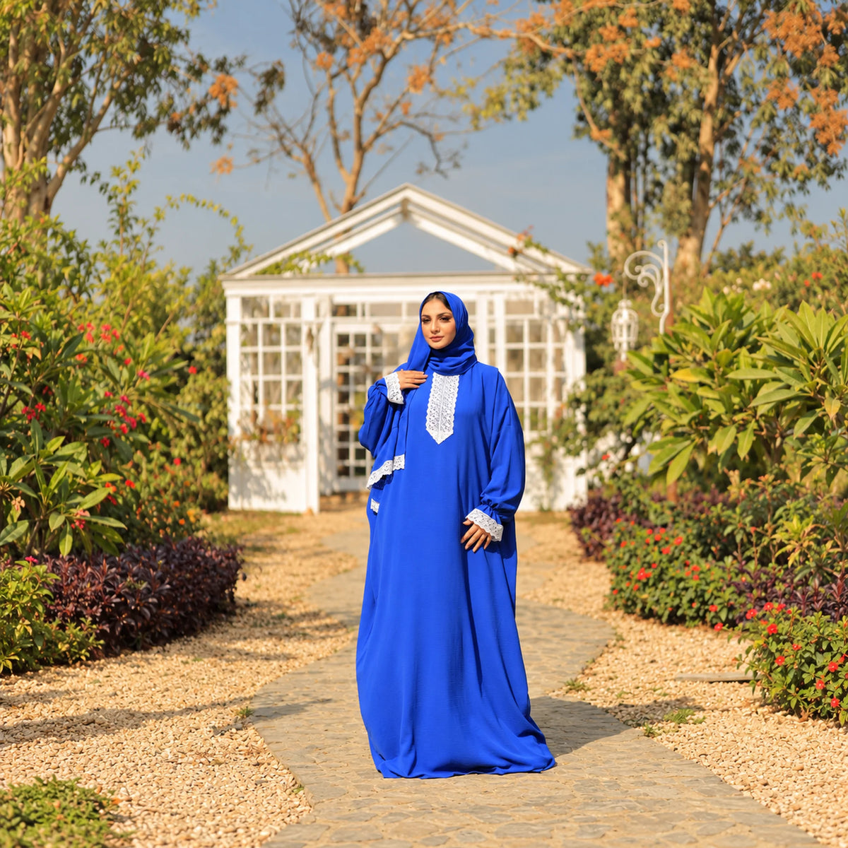 Model wearing Tallah's royal-blue CY Isdal with lace trim, gallery photo 1
