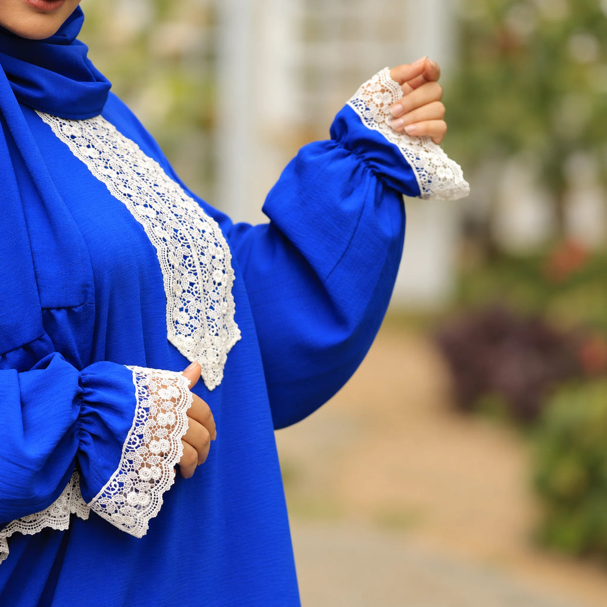 Model wearing Tallah's royal-blue CY Isdal with lace trim, gallery photo 2