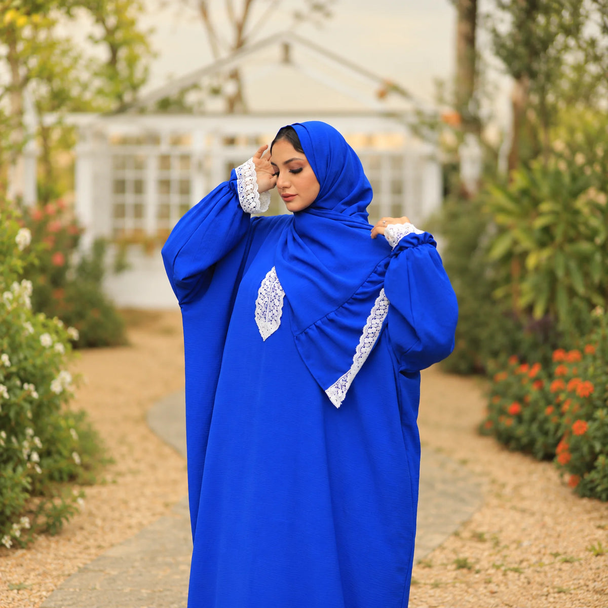 Model wearing Tallah's royal-blue CY Isdal with lace trim, gallery photo 3