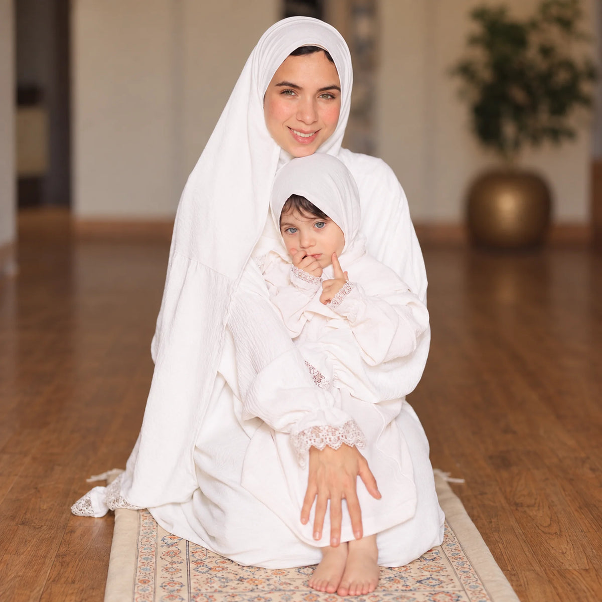 Model wearing Tallah's white CY Isdal with lace trim, gallery photo 1