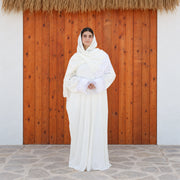 Model wearing Tallah's white Velvet Isdal with lace trim, gallery photo 1