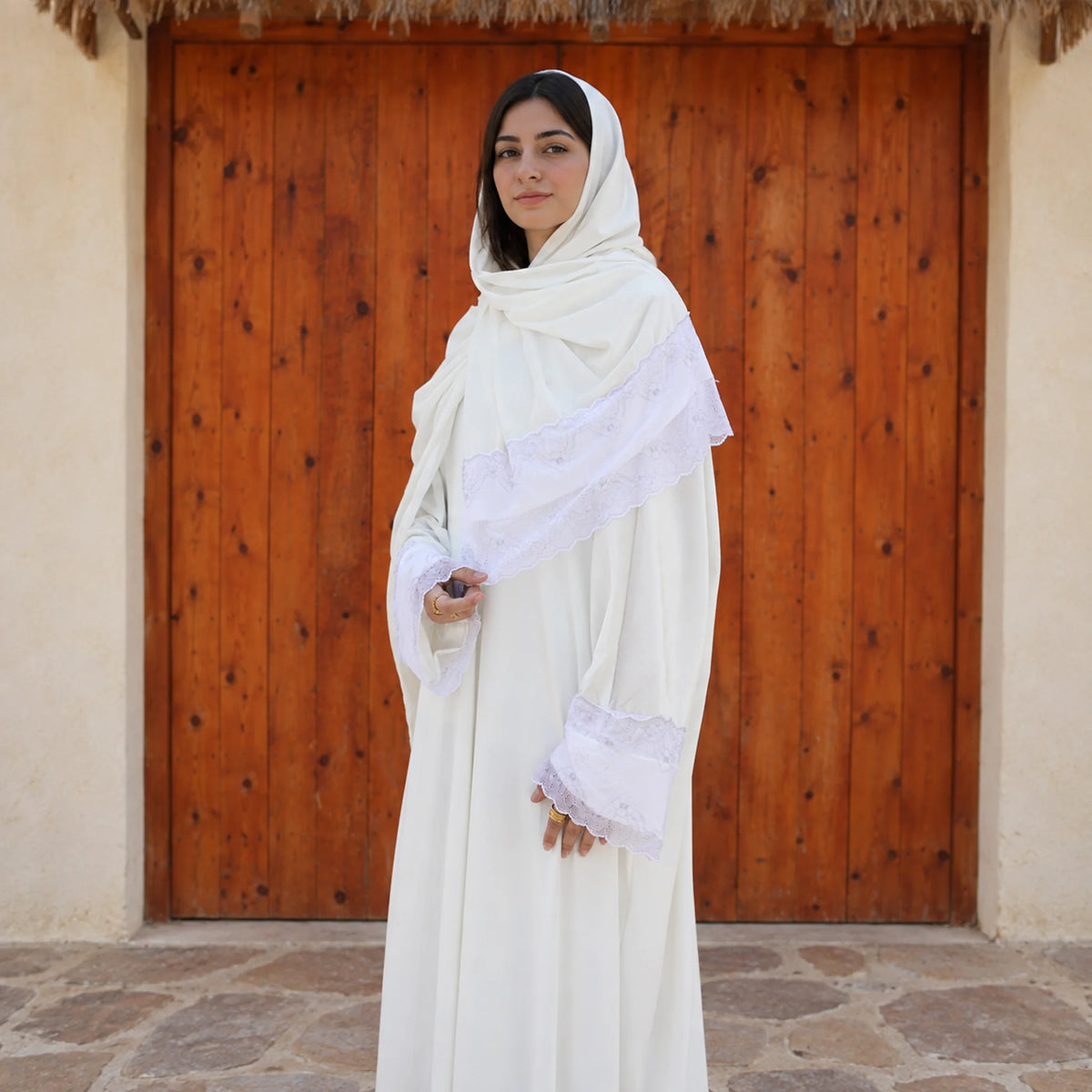 Model wearing Tallah's white Velvet Isdal with lace trim, gallery photo 4