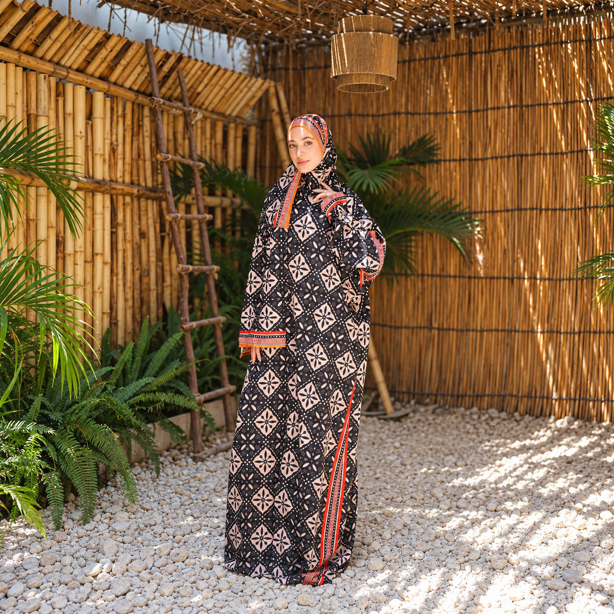 Isdal in Soft Mabrad in Black & cream, geometric print with orange trim with matching veil, gallery view 4.