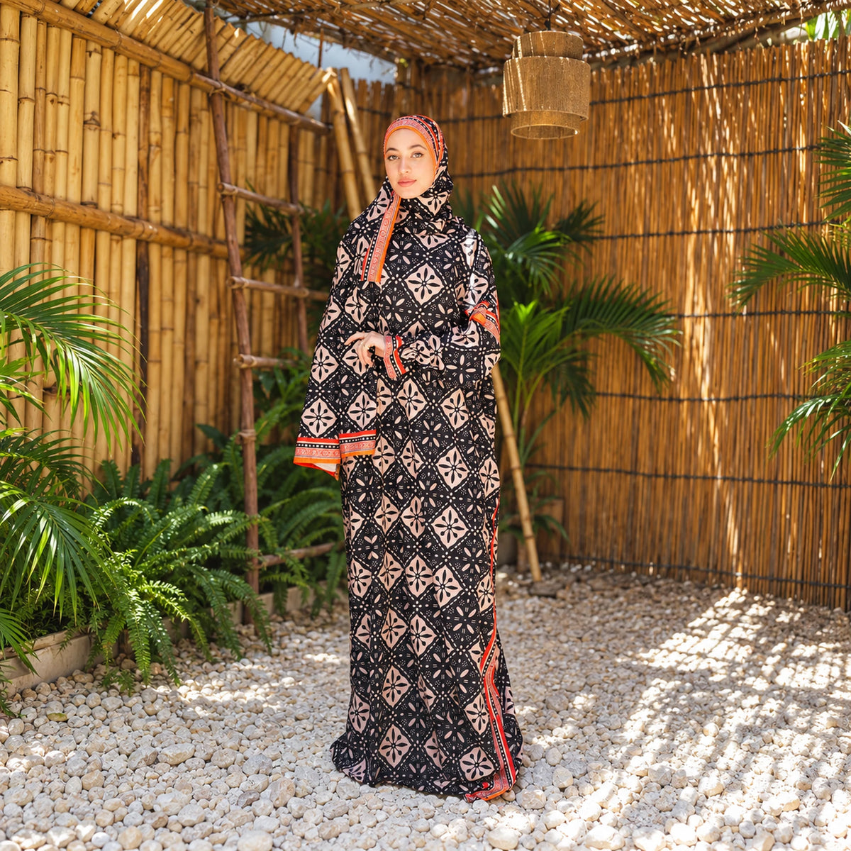 Isdal in Soft Mabrad in Black & cream, geometric print with orange trim with matching veil, gallery view 5.