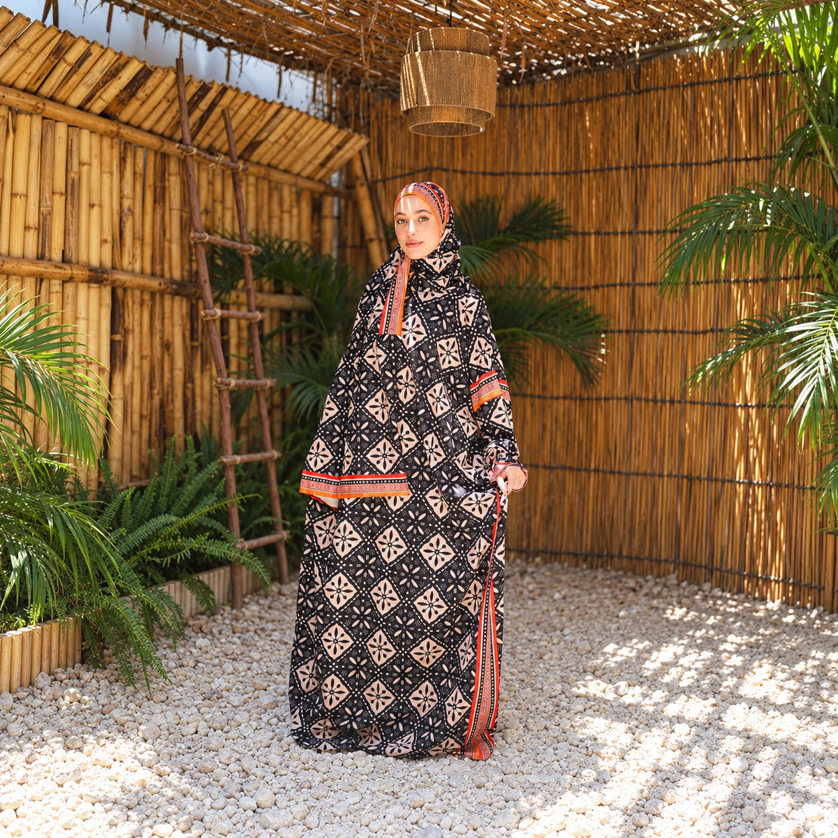 Isdal in Soft Mabrad in Black & cream, geometric print with orange trim with matching veil, gallery view 6.