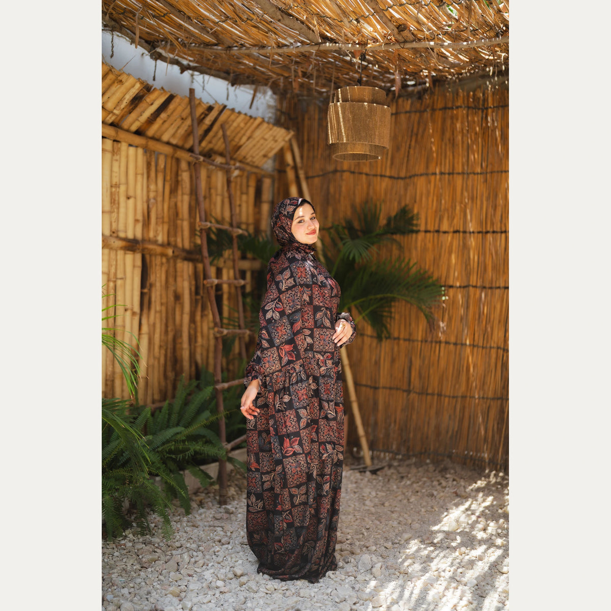 Tallah satin Isdal in Black and Rust, patchwork pattern, full-length side view.