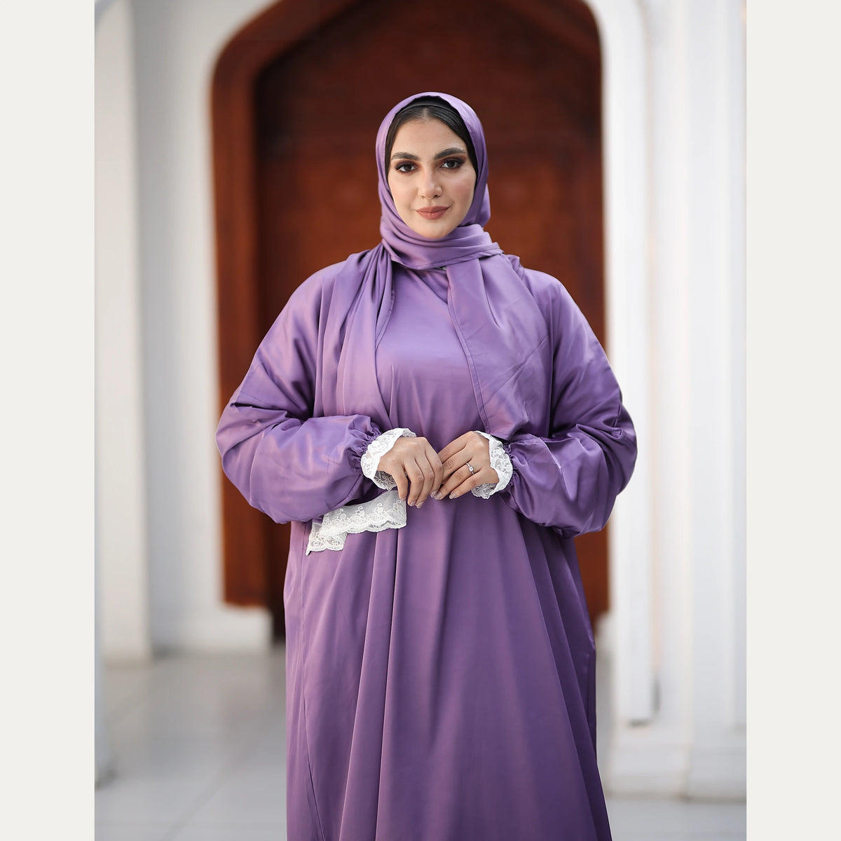 Tallah satin Isdal in Lilac, lace detail, front view showing white lace cuffs.