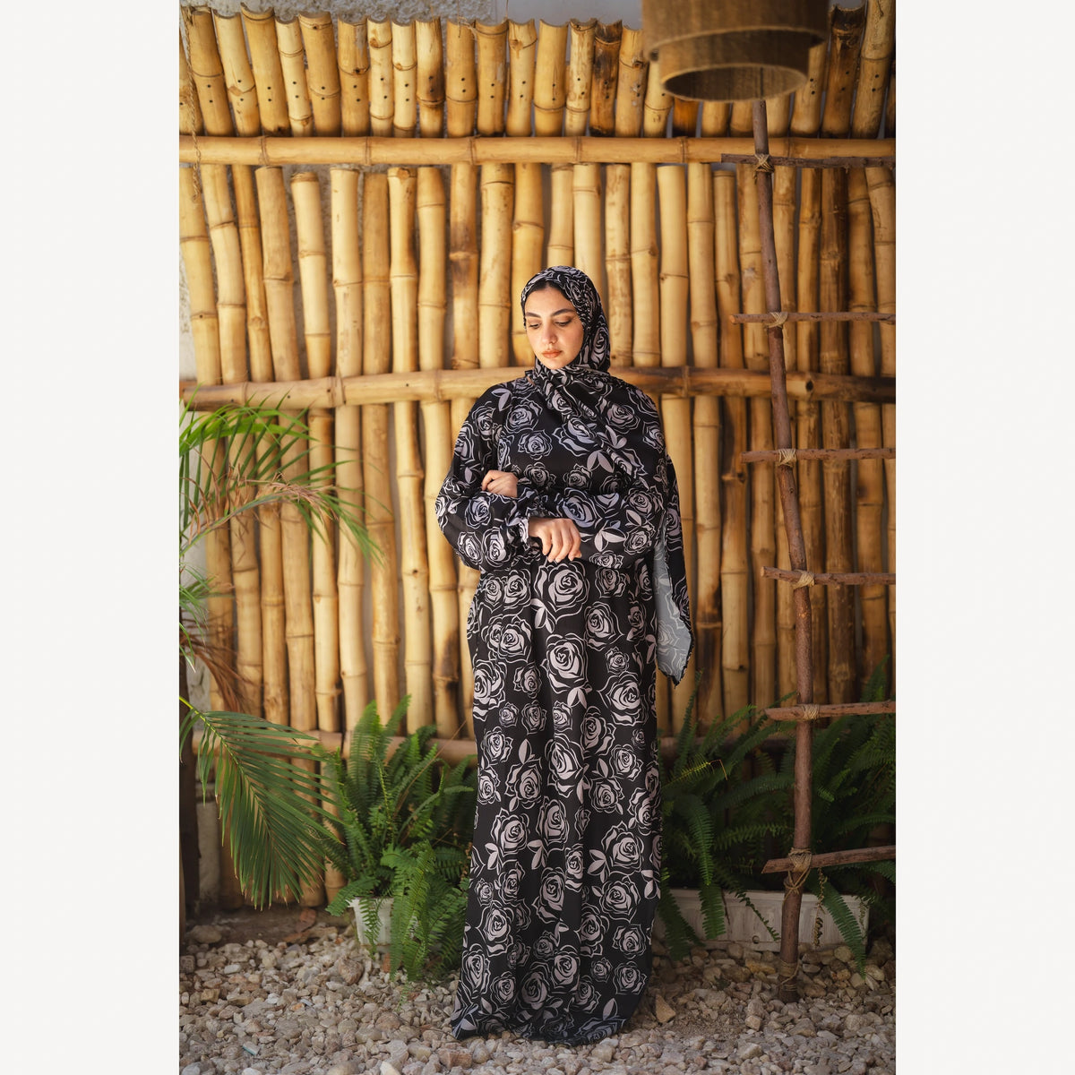 Tallah satin Isdal in black grey rose, full-length front view looking down.