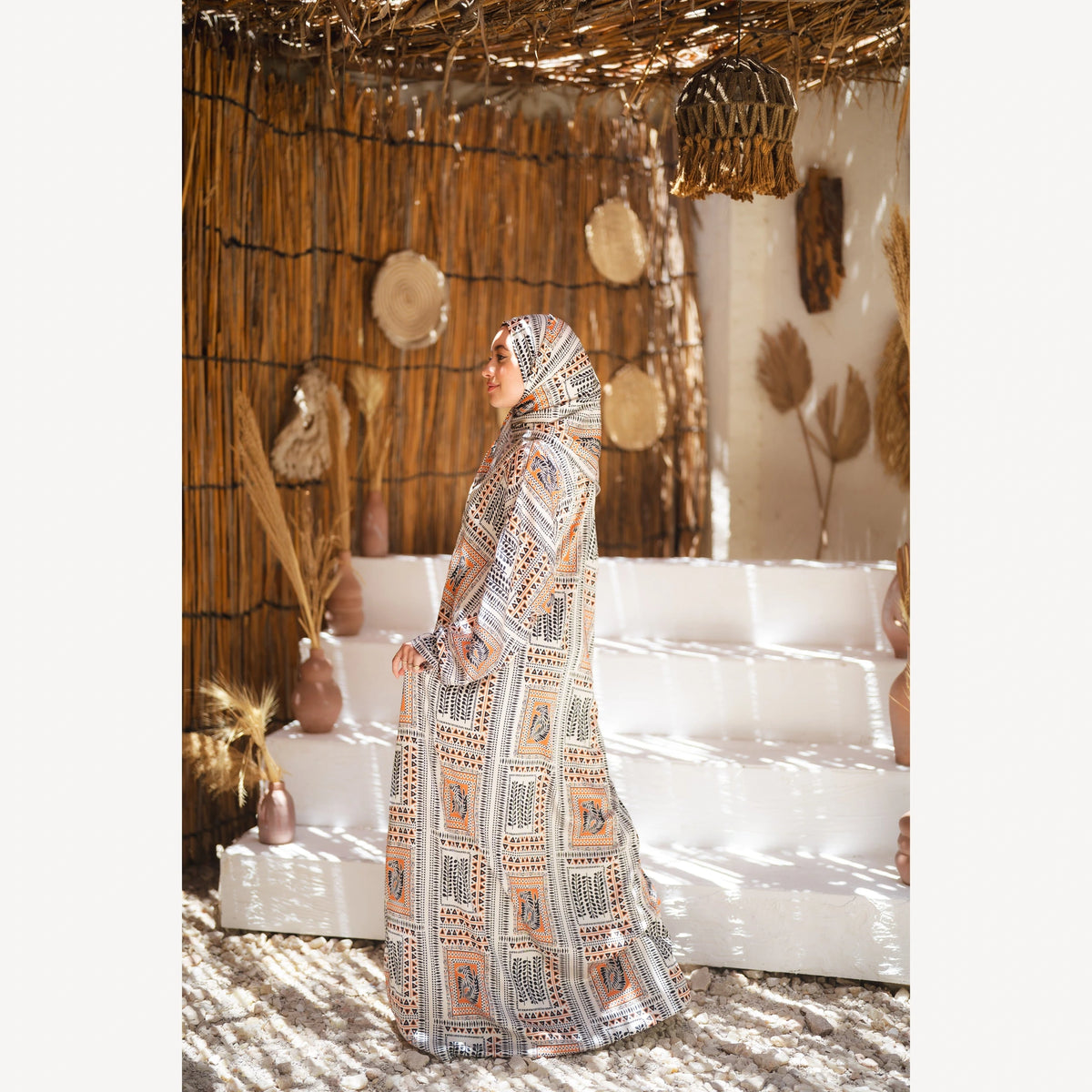 Tallah satin Isdal in cream black orange geometric, full-length side view.