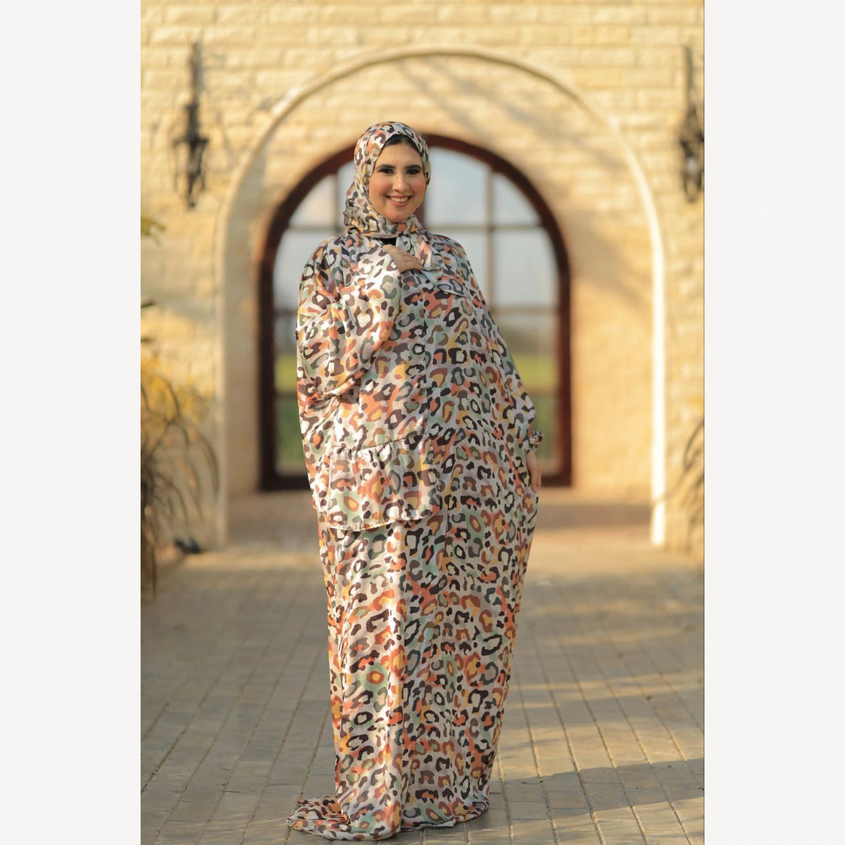 Tallah satin Isdal in cream orange brown leopard, full-length front view.