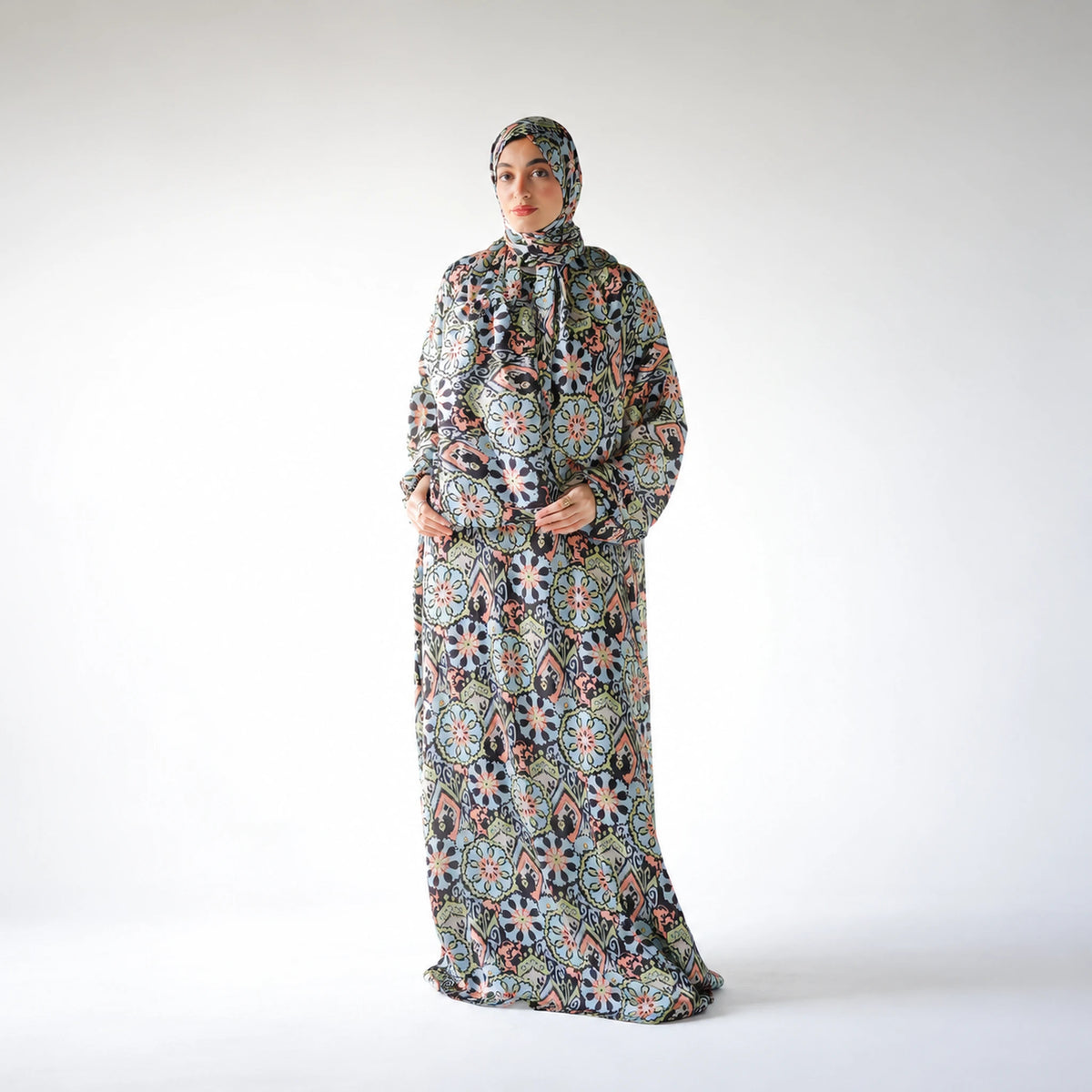 Multicolour satin Isdal with pastel blue, peach and green floral medallions on black, full-length front view.