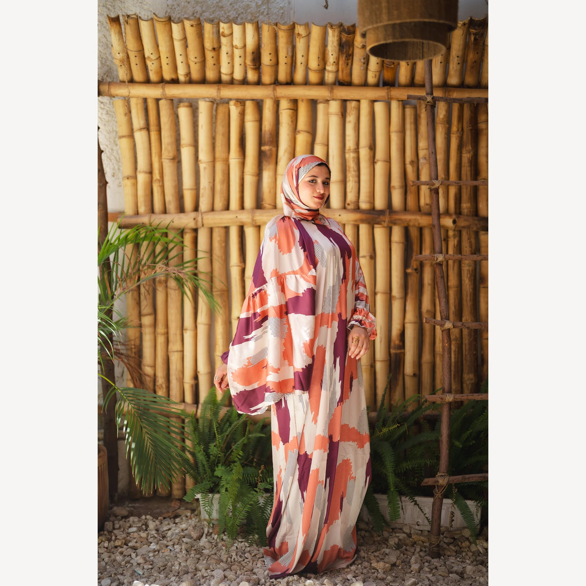 Tallah satin Isdal in orange plum cream brushstroke, full-length side view.