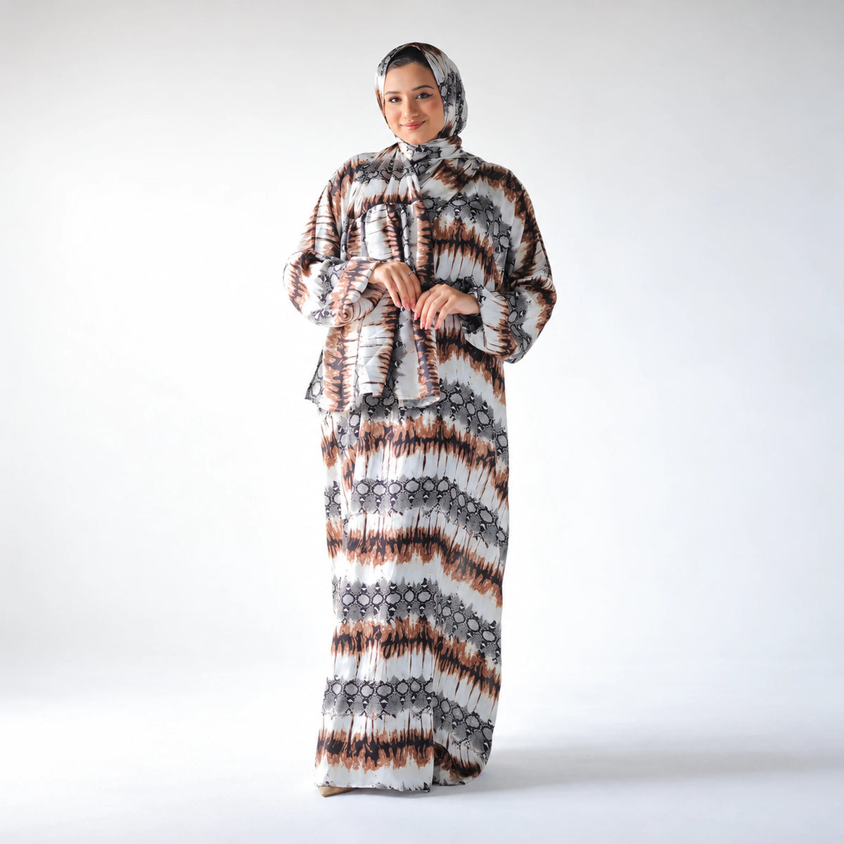 White, black and brown satin Isdal with an abstract animal-inspired print, full-length front view.